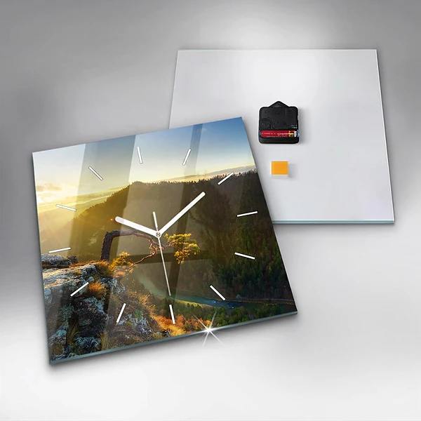 Wanduhr quadratisch mit motiv Sonnenuntergang über den Bergen