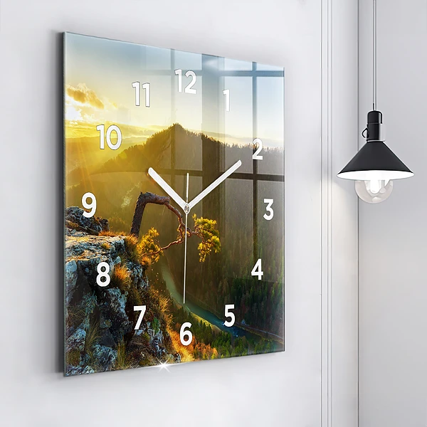 Wanduhr quadratisch mit motiv Sonnenuntergang über den Bergen