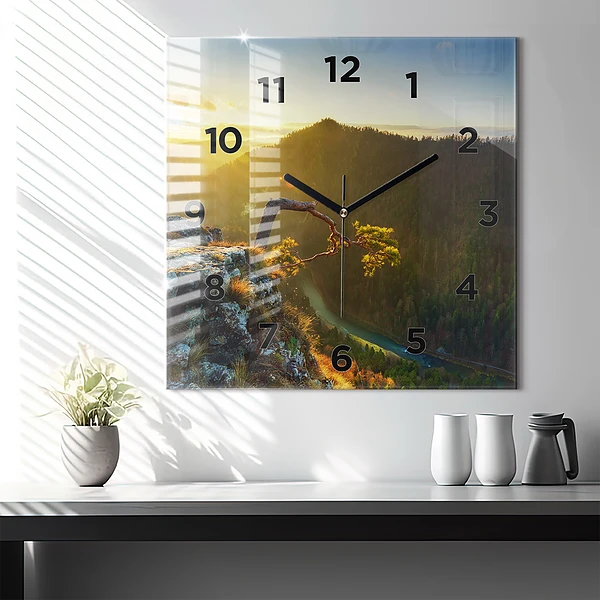 Wanduhr quadratisch mit motiv Sonnenuntergang über den Bergen