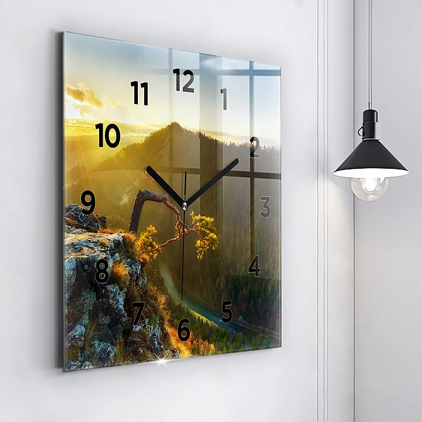 Wanduhr quadratisch mit motiv Sonnenuntergang über den Bergen