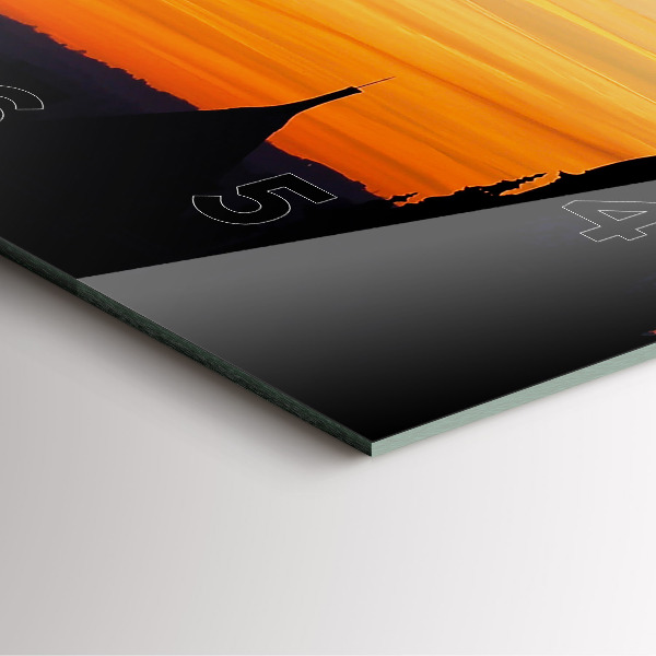 Wanduhr modern quadratisch Gebäude und Sonnenuntergang