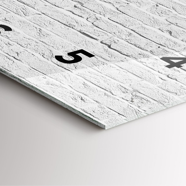 Wanduhr quadratisch Backsteinmauer