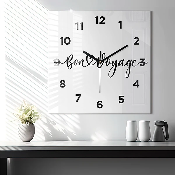 Wanduhr quadratisch Inschrift Bon voyage