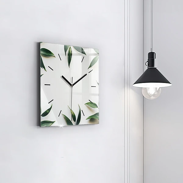 Wanduhr modern quadratisch Rahmen aus Blättern