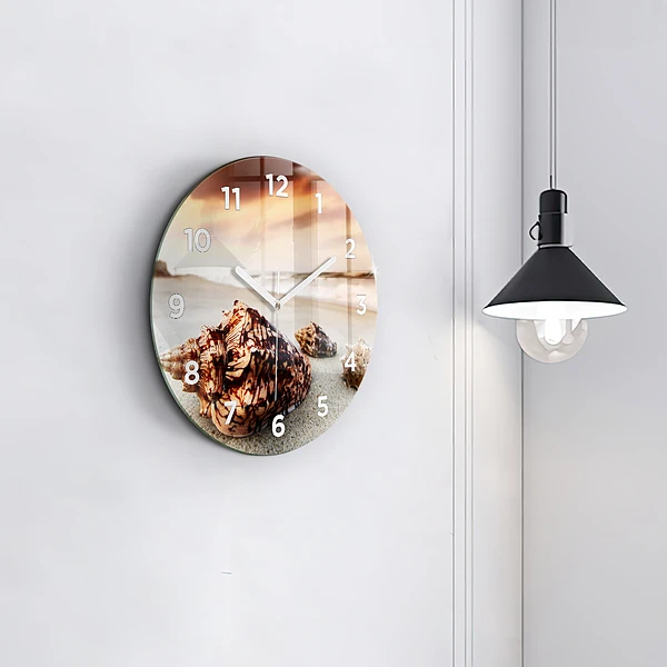 Wanduhr rund Muschel am Strand
