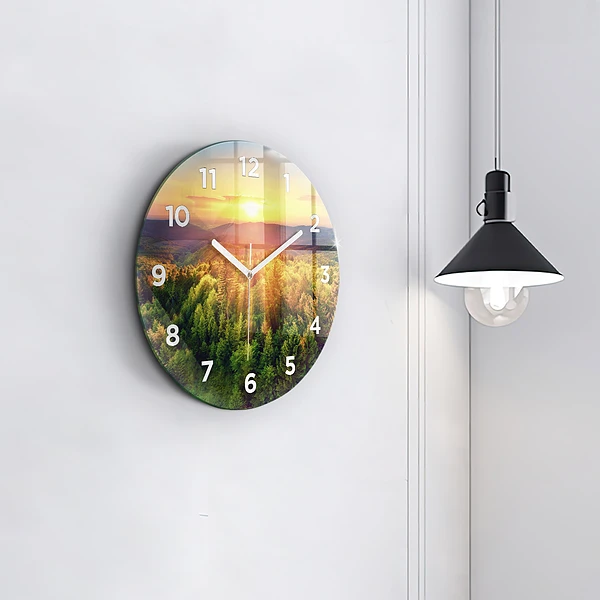 Wanduhr rund Sonnenuntergang über den Hügeln