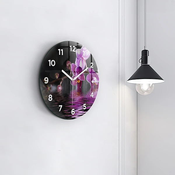 Wanduhr glas rund Orchideenblüte auf dem Wasser