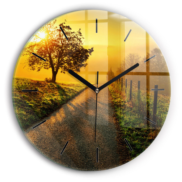 Wanduhr glas rund Nebel bei Sonnenaufgang