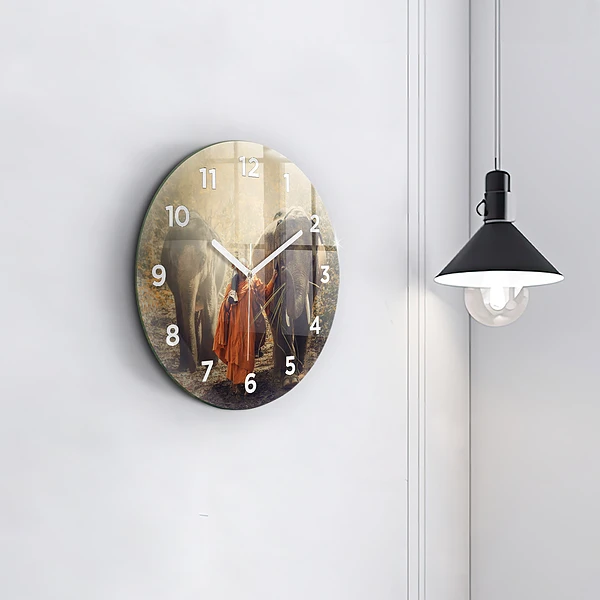 Wanduhr rund mit motiv Mönch führt Elefanten