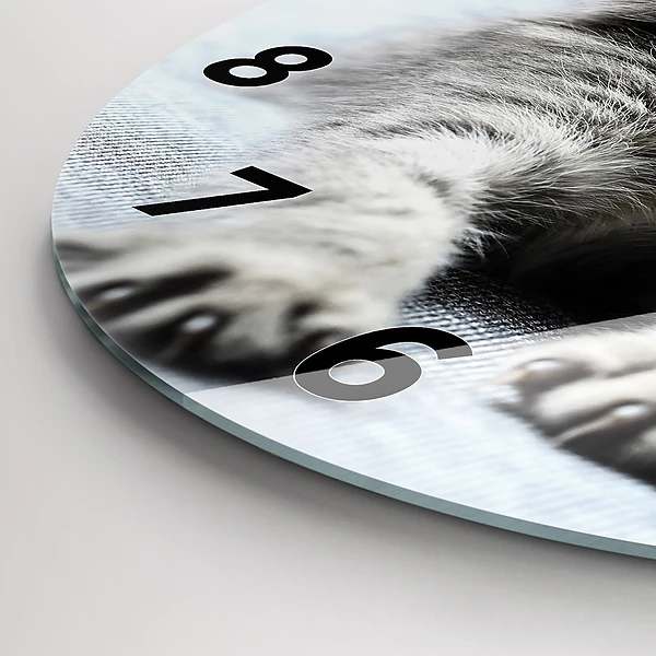 Wanduhr rund mit motiv Katze auf dem Sofa