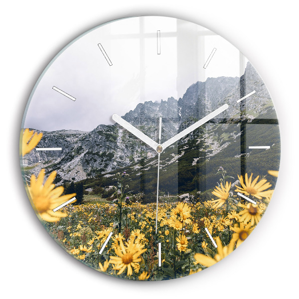Wanduhr rund Blumenwiese in den Bergen