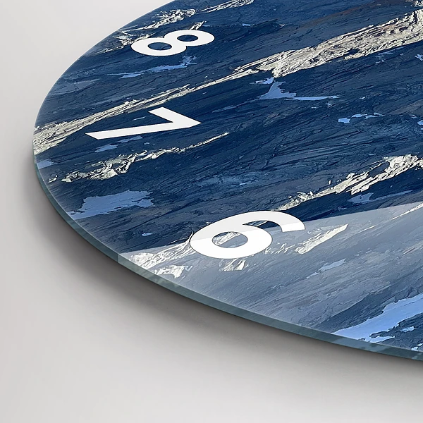 Wanduhr glas rund Die Alpen im Winter