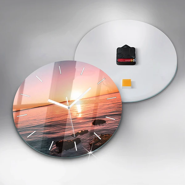 Wanduhr glas rund Felsen bei Sonnenuntergang