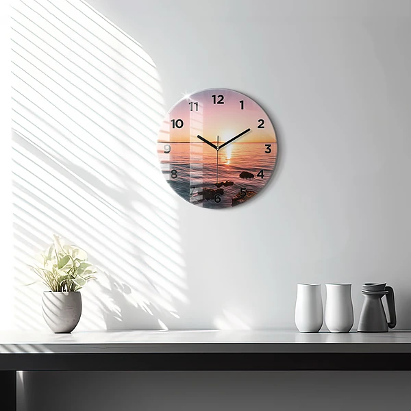 Wanduhr glas rund Felsen bei Sonnenuntergang