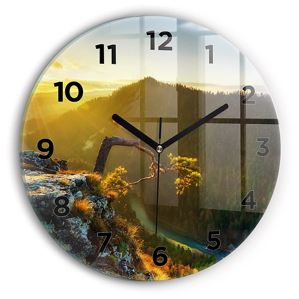 Wanduhr glas rund Sonnenuntergang über den Bergen
