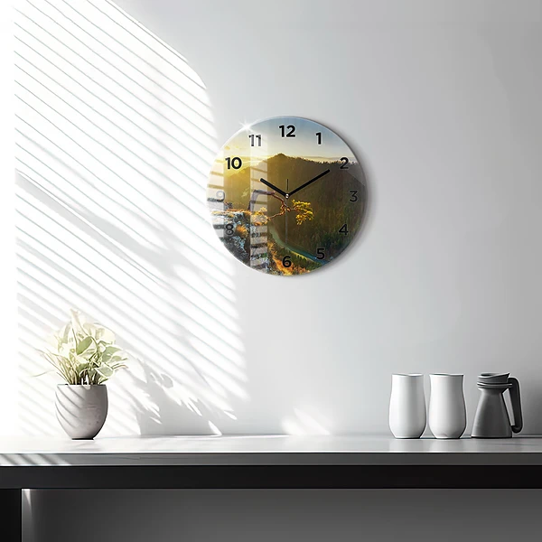 Wanduhr glas rund Sonnenuntergang über den Bergen