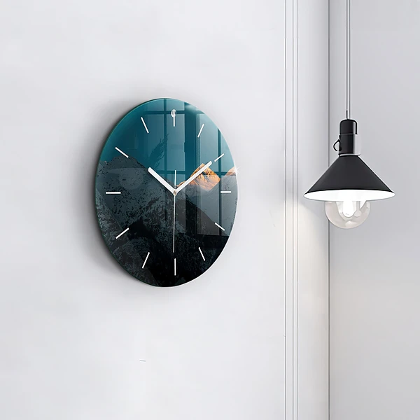 Wanduhr glas rund Sonnenuntergang in den Bergen